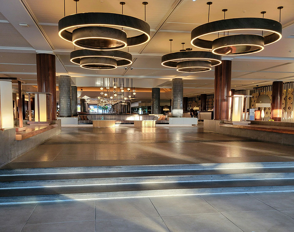 Hotel public space artwork designed for high-traffic environments with lighting compatibility and low-glare surface performance
