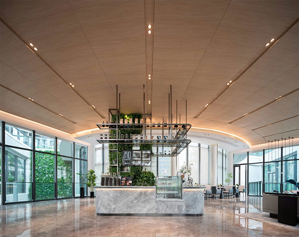 Hotel public space artwork integrated with architectural features, designed to create immediate visual impact in lobby environments
