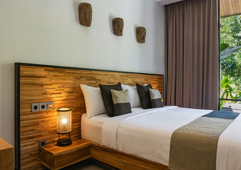 Guestroom Decor 7 Small framed artwork in hotel bedside wall decor