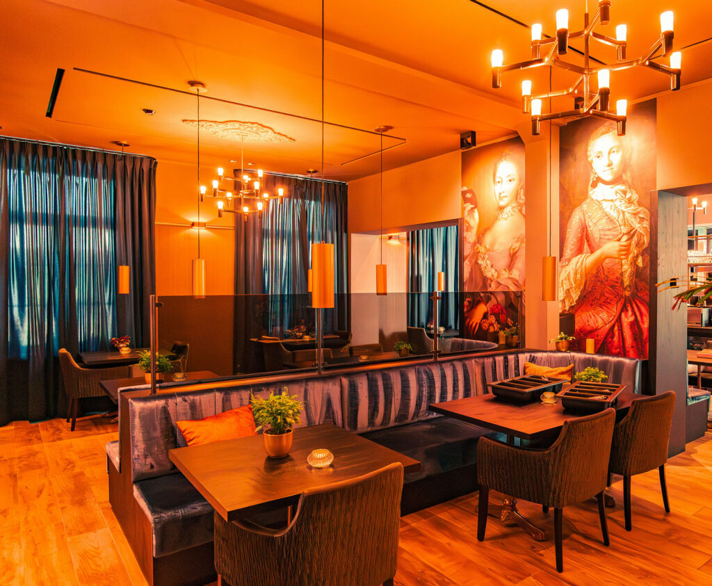 Dining lounge wall art for restaurant interior design in warm ambient lighting