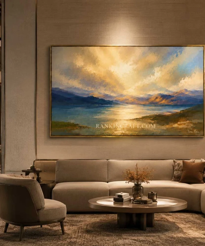 Large contemporary landscape painting installed in luxury hotel lobby with gold frame