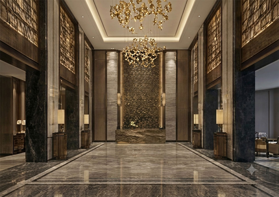 Hospitality Art Projects 2 Grand luxury hotel lobby featuring a massive custom textured feature wall behind the reception desk and dramatic golden chandeliers.