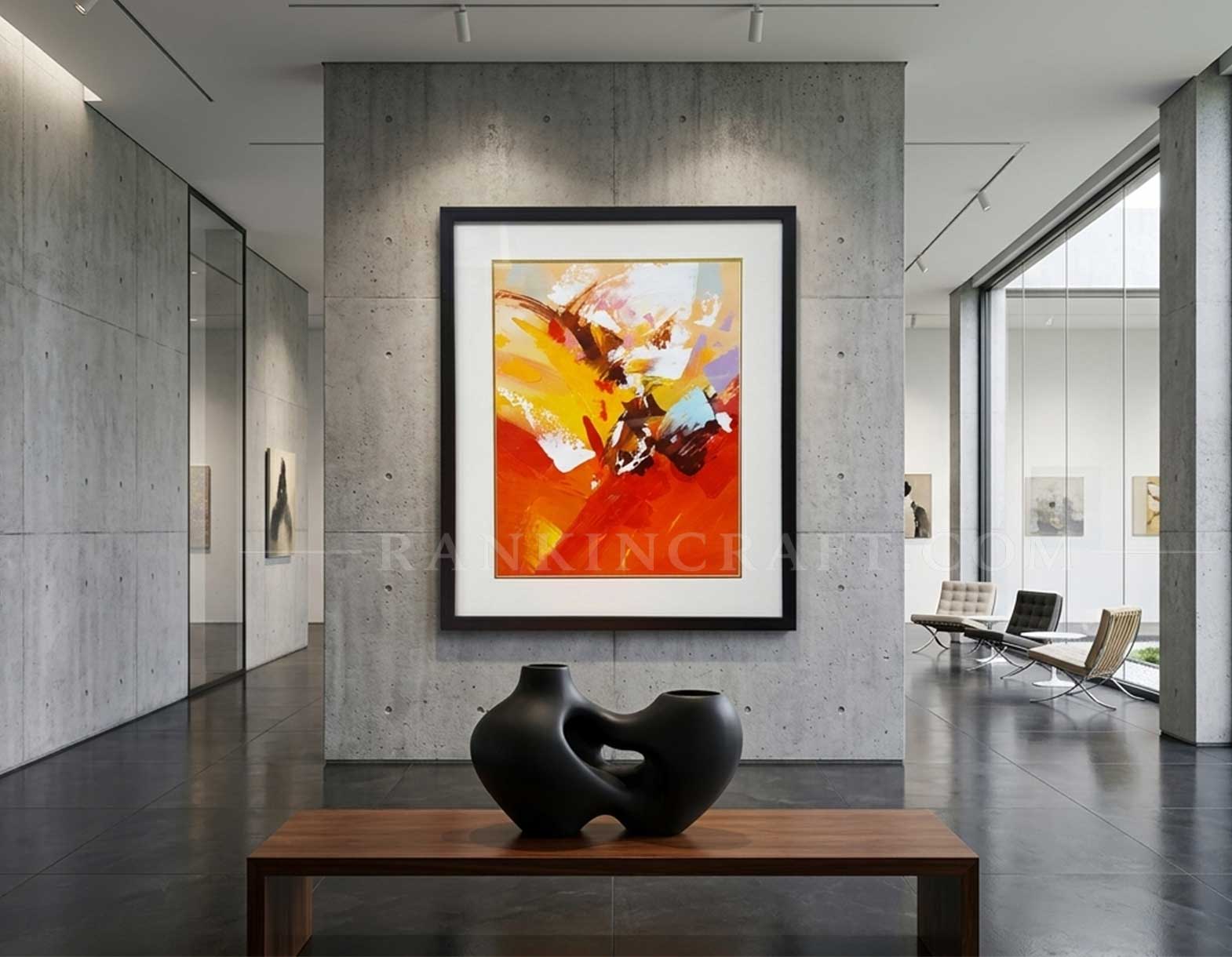 Framed vibrant orange abstract oil painting displayed in a modern art gallery space.