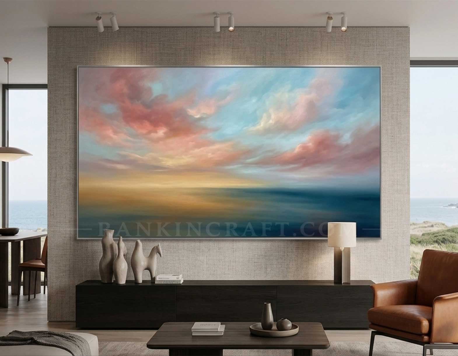 Ocean Horizon: Large-Scale Abstract Seascape 1 An in-situ photograph showing a large-scale abstract painting hung above a sofa in a modern, luxury living room, with natural light.