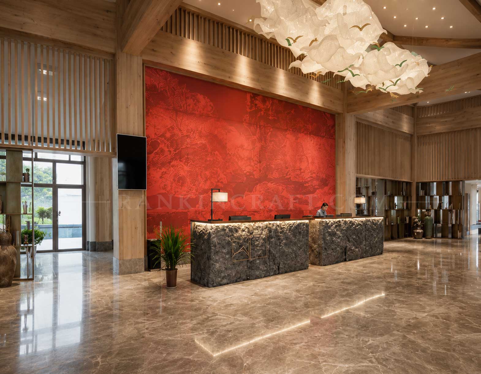 Mountain Resonance: Large-Scale 3D Chinese Landscape Wall Art 1 Large red textured mural artwork installed behind a stone reception desk in a luxury hotel lobby.